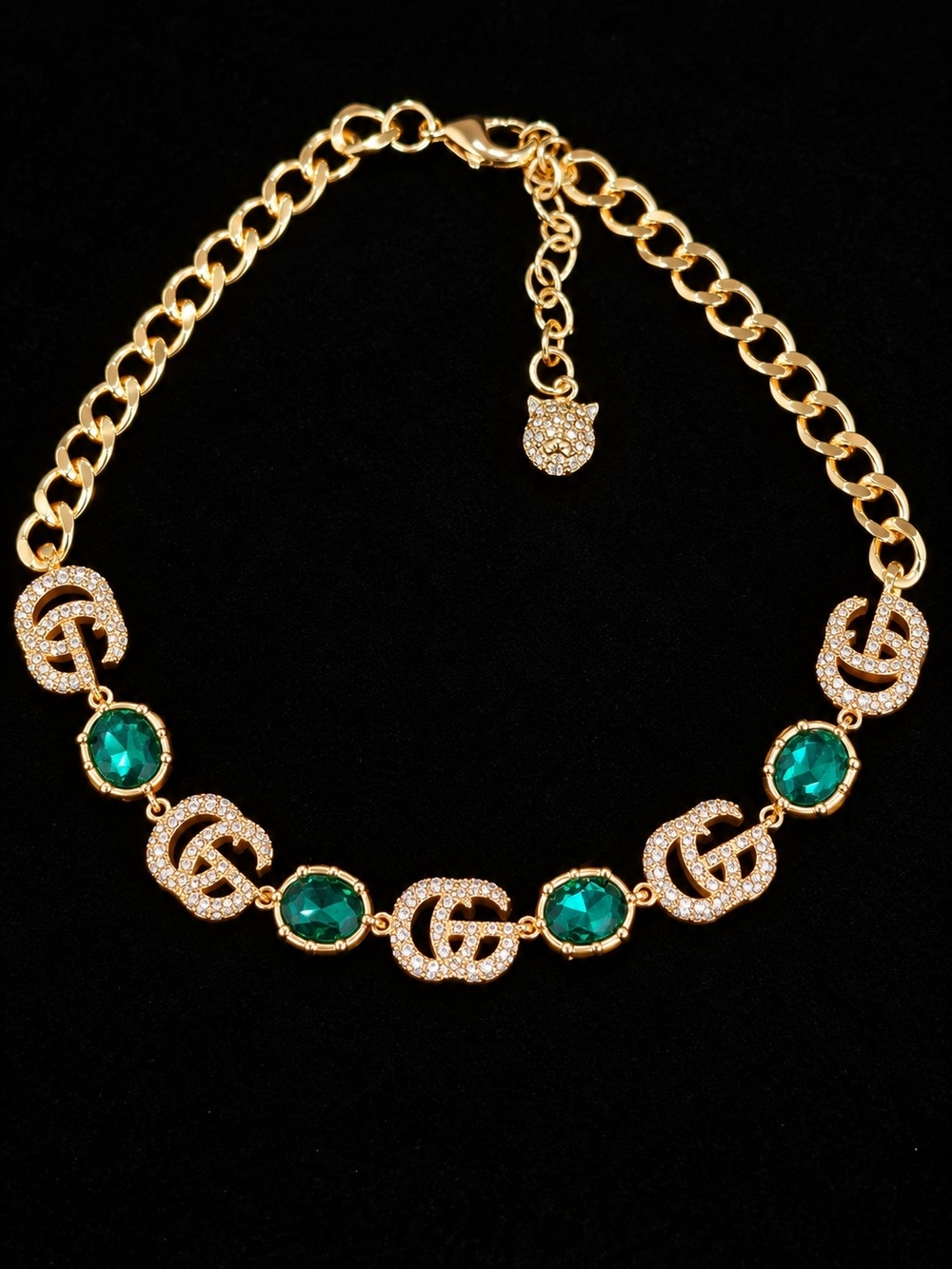 Gucci Gold-Tone Necklace with Emerald Green Stones and Crystal Links